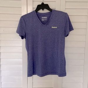 Purple Reebok women’s dri-fit shirt. Size small